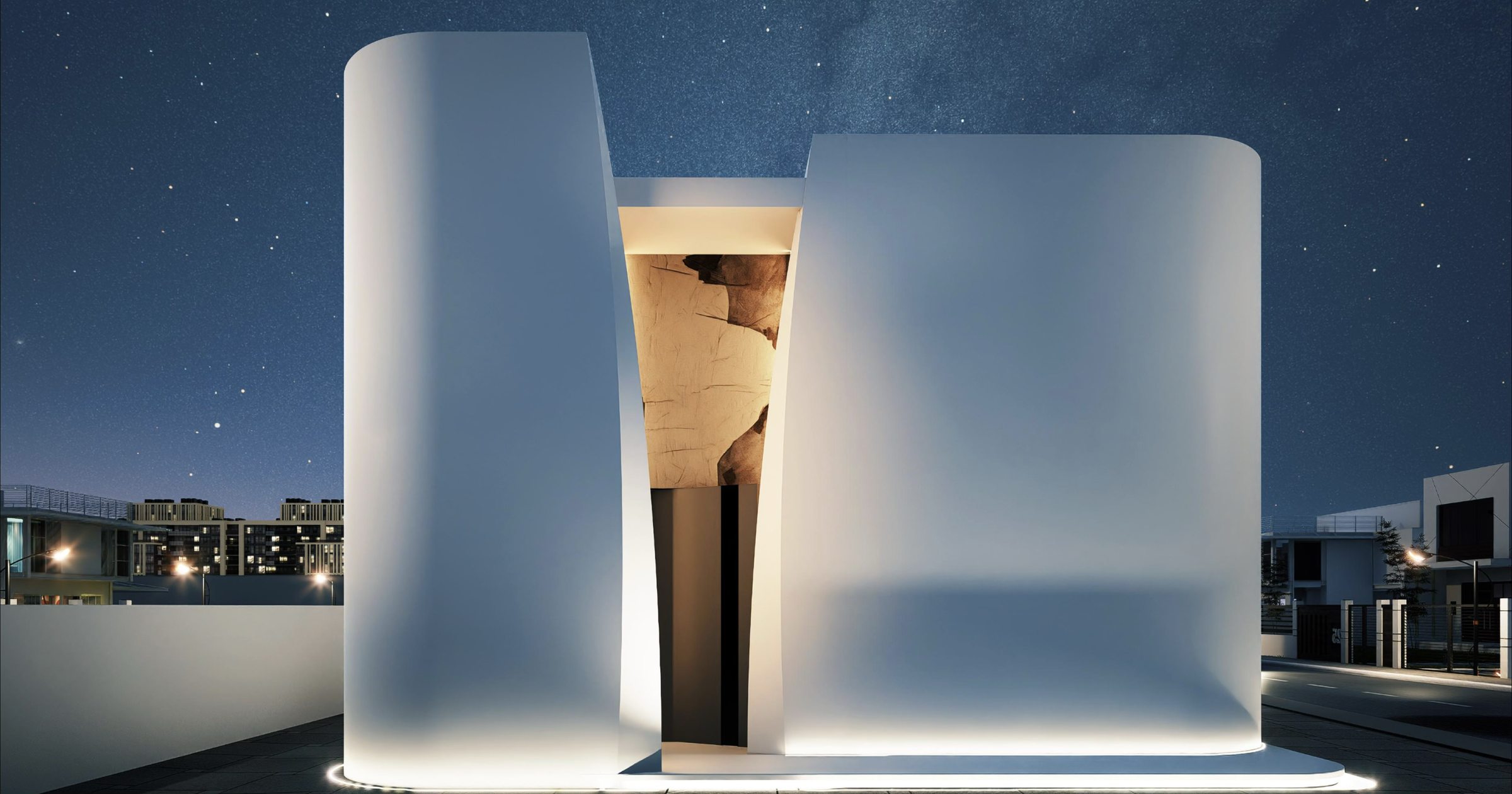 The entrance: the volumes pull apart to reveal warm natural marble